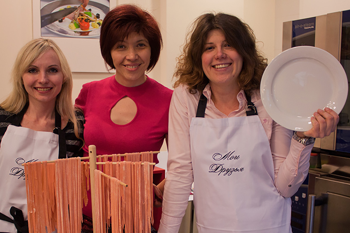 Participants of lesson in honour to International Women's Day. Cooking school in Ukraine.