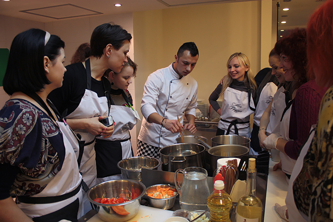 Participants of the lesson. Famous Soups from Three Continents. Cooking school in Ukraine.